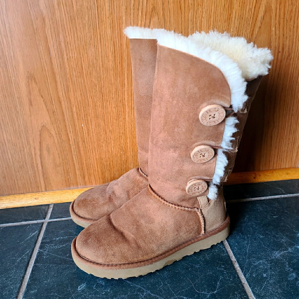 UGG boots badly button